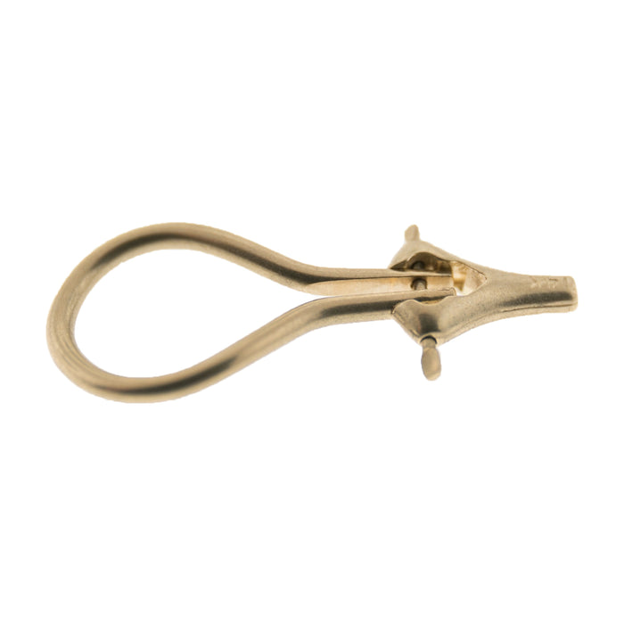 Gold Omega Clip Earring  Myron Toback Inc. Gold Omega Clip Earring